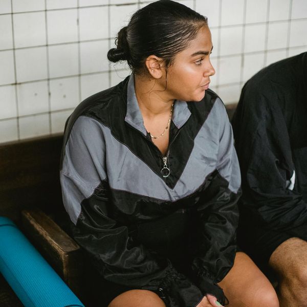 Man in sports wear feeling energetic after morning workout